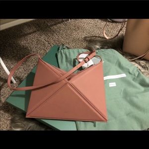 One time used small size Mlouye crossbody bag